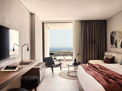 Magma Resort Santorini, caché sur les pentes désertiques de Santorin - Hôtels - image de gauche