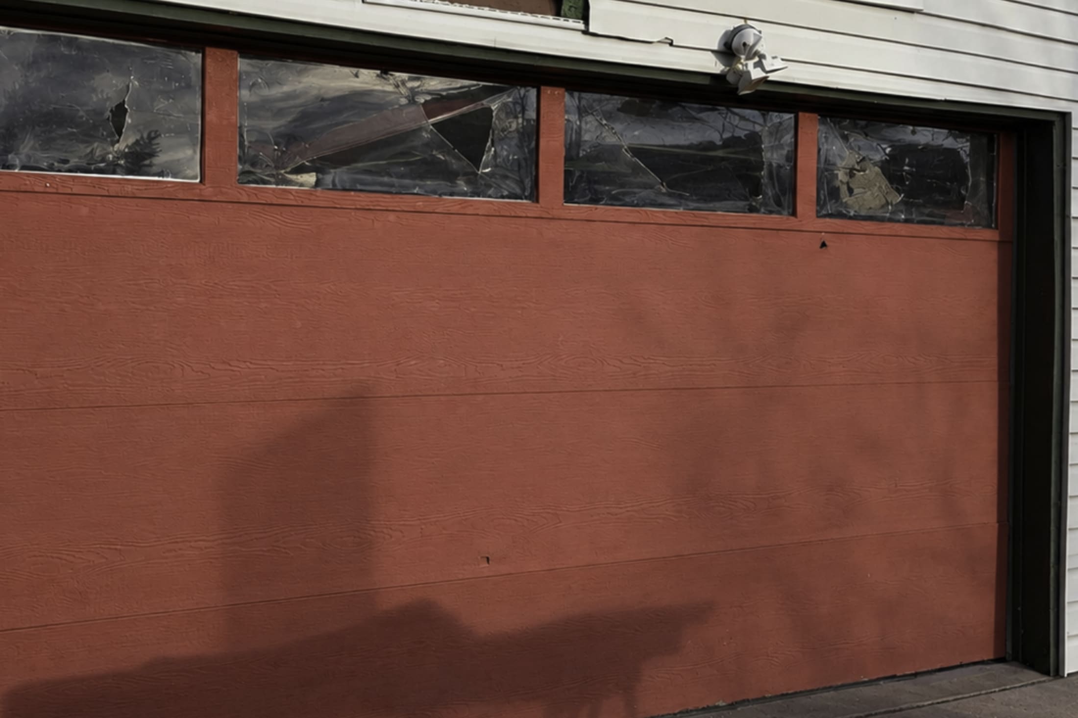 garage door window repair — before