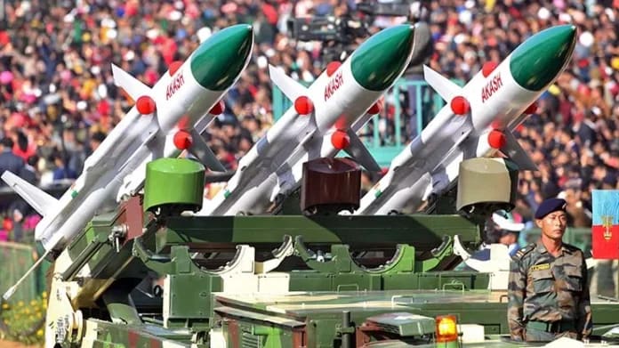 Indian military personnel during a defense equipment demonstration.