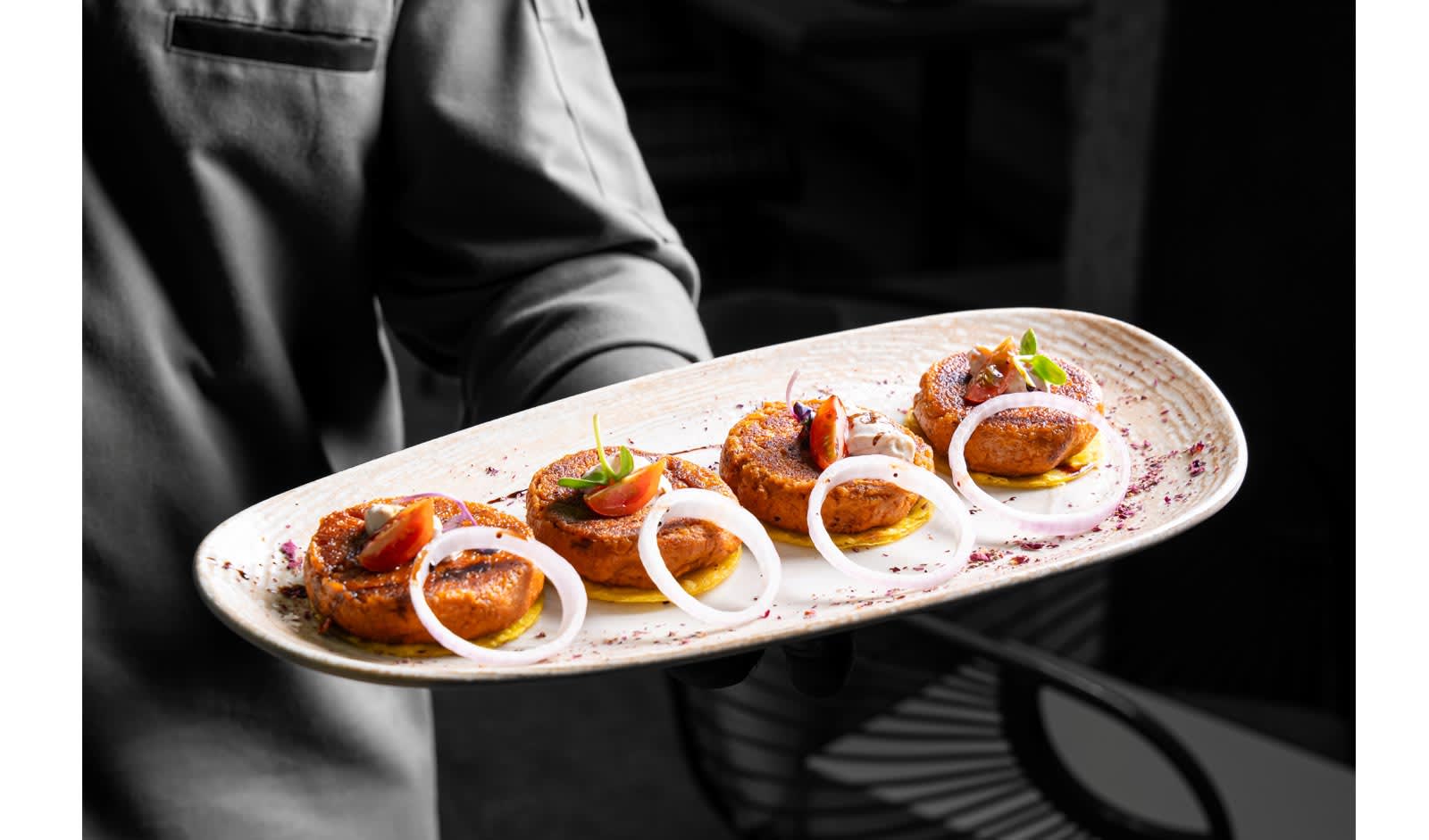 A vibrant plate of modern Indian cuisine showcasing fusion dishes.