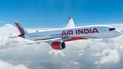 Air India plane on the runway at Jaipur airport after bomb threat incident.