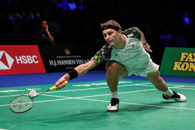A badminton player in action during the Denmark Open 2023.