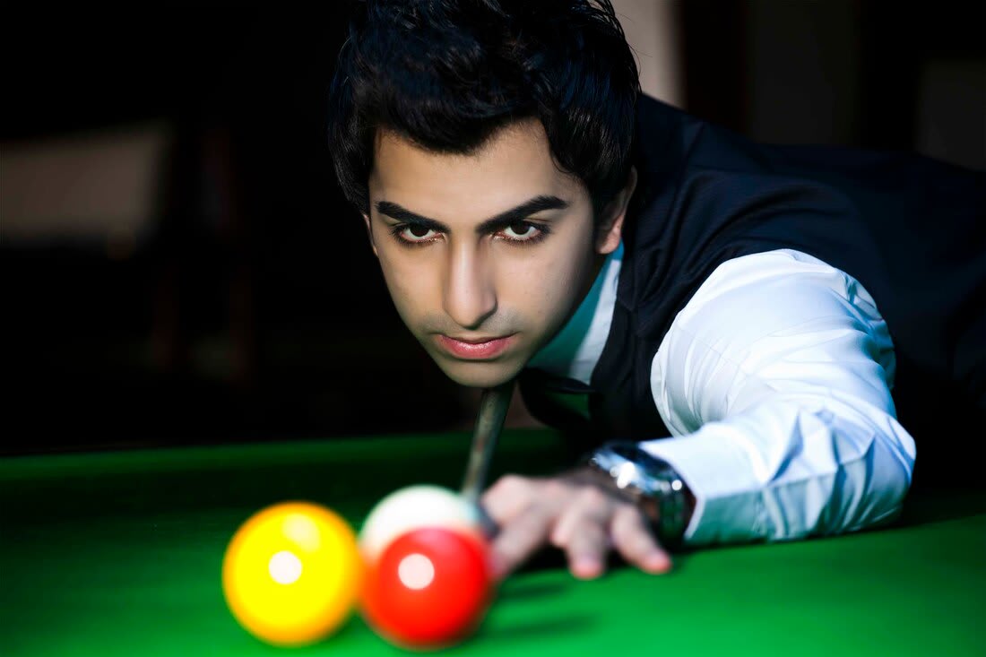 Pankaj Advani celebrating his victory at the World Billiards Championship.