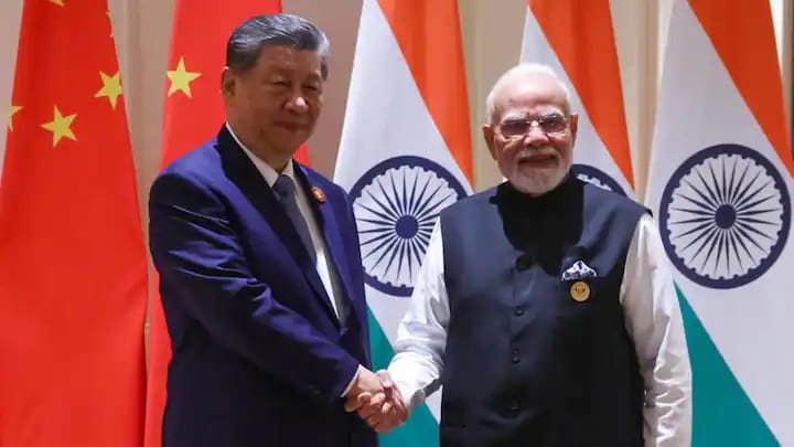 Leaders of India and China discussing diplomatic relations.