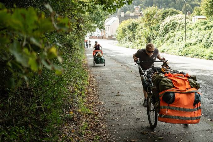 Karl Bushby on his world trek, surrounded by stunning landscapes.