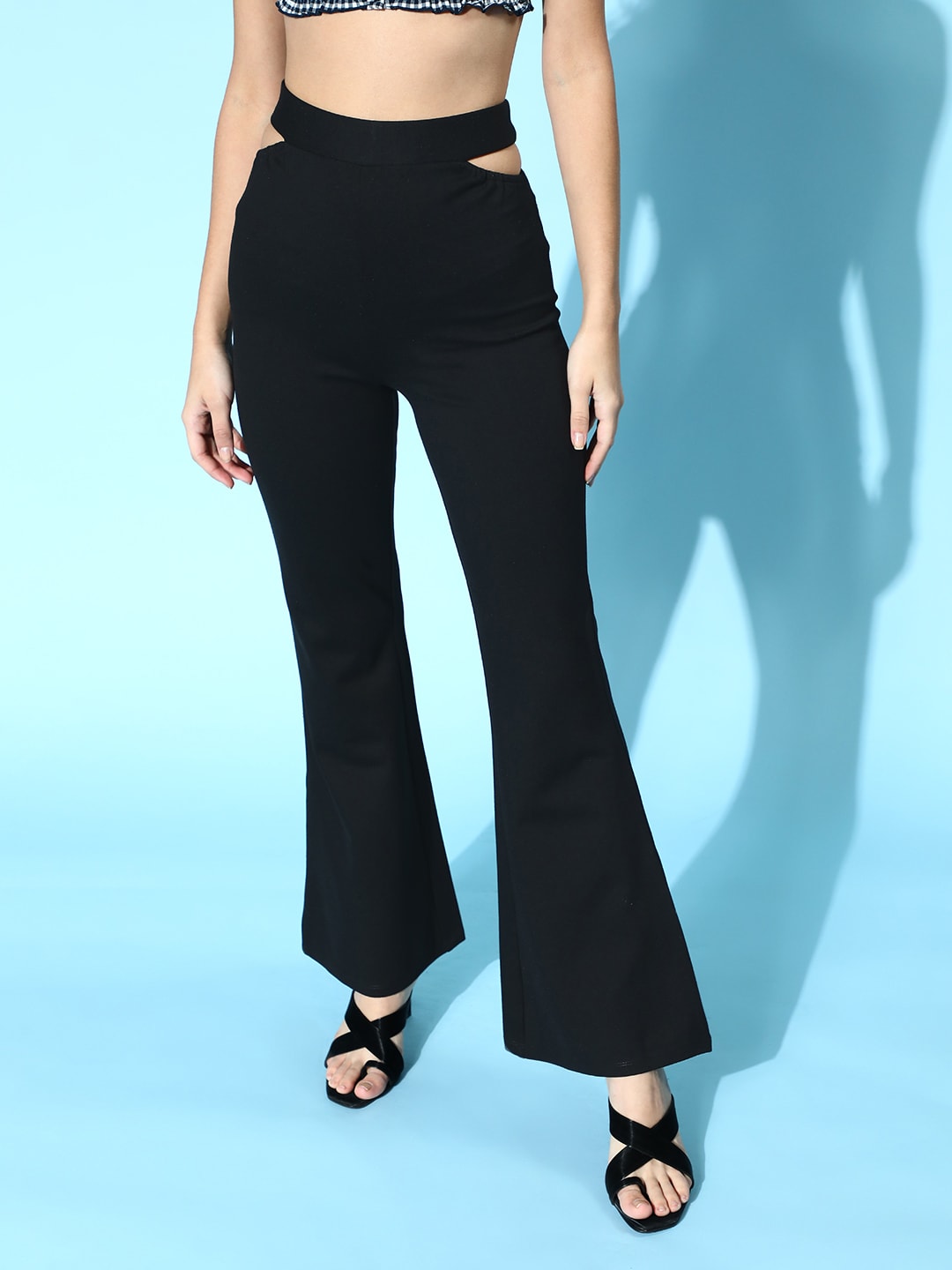 SASSAFRAS Women Black Solid Kick Flare Trousers Price in India
