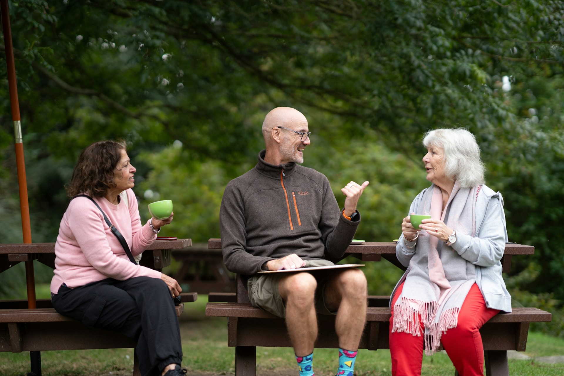Image of 3 people having a discussion