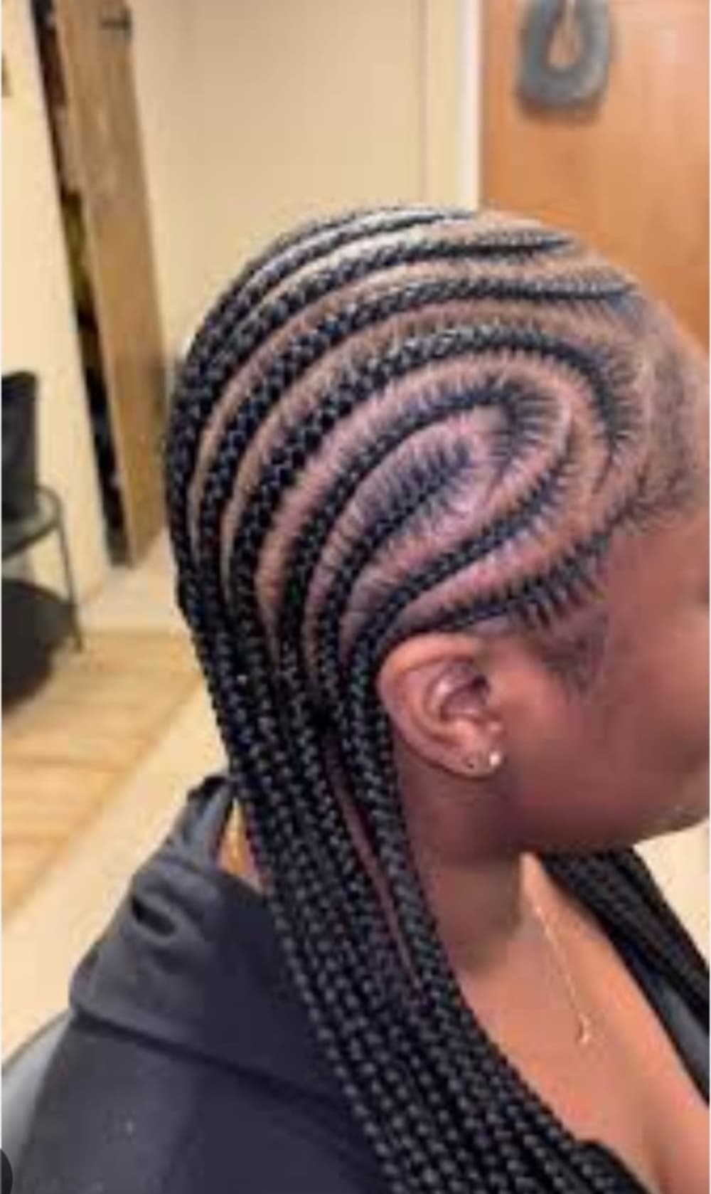 Alicia Keys Curved Cornrows