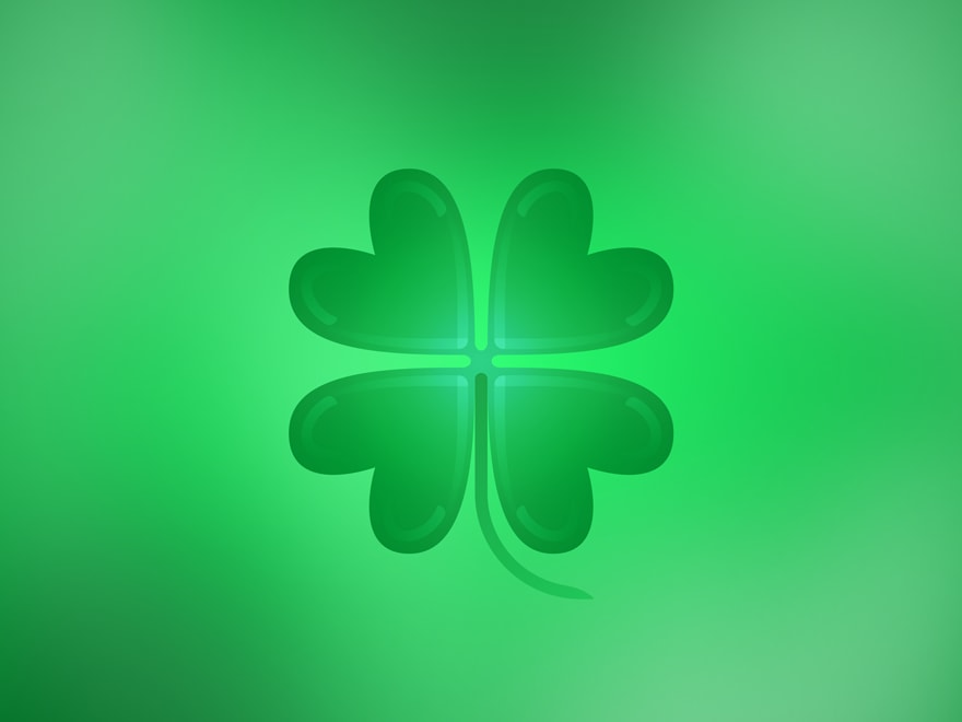 An illustration of a four-leaf clover, on a green gradient background