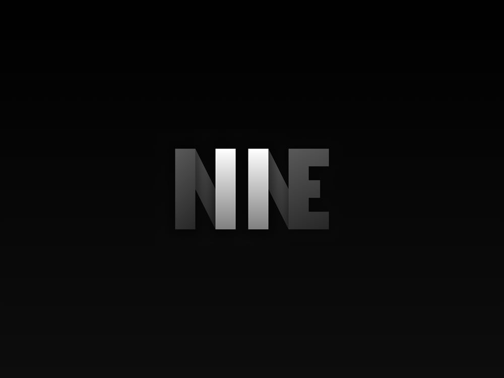 'Nine' text that highlights two columns, in rememberance of the World Trade Center towers and paying tribute to the tragic events of 9/11/2001.