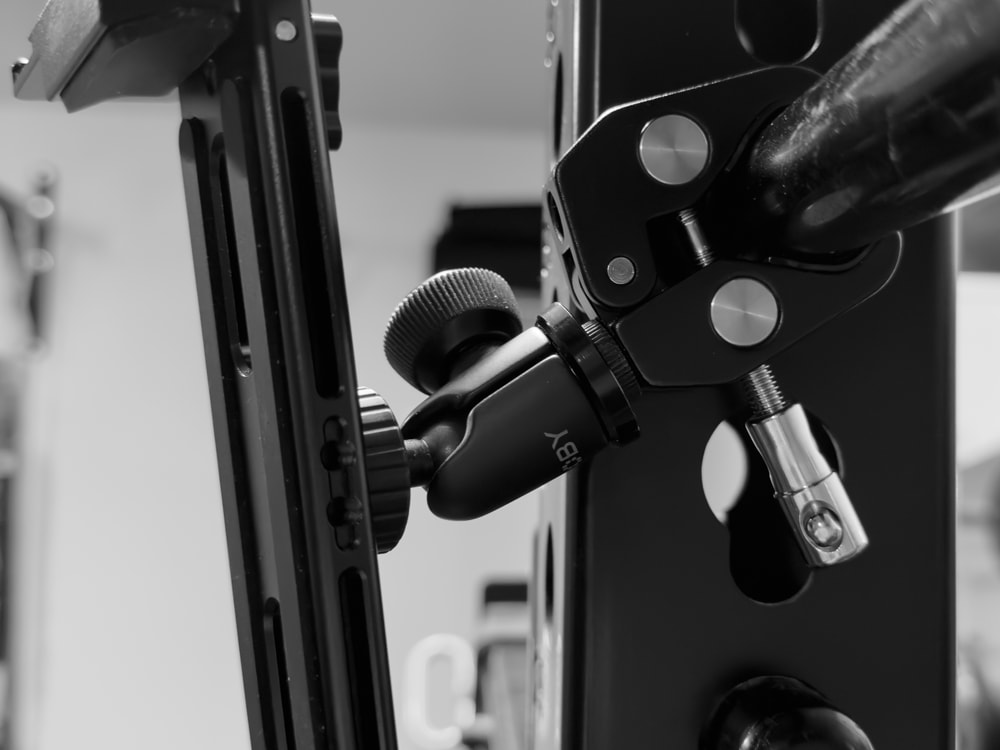 Photo of an iPad mounting solution created using several components and attached to a Rogue Fitness Monster Rack.