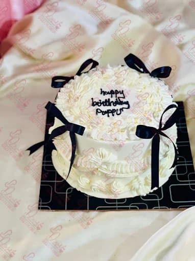 White Cake with Black Ribbons Mothers Day Cake Islamabad