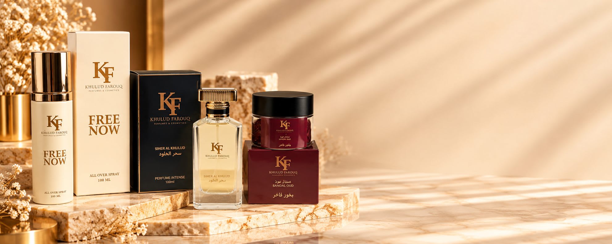 Khulud Farouq perfume bottles and boxes on a champagne marble plinth with dried flowers and gold accents