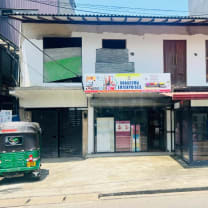 Land For Sale with house and shops