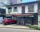 Land For Sale with house and shops 5