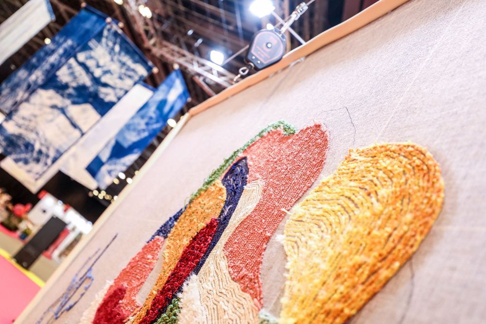 World Art Dubai 2026 exhibition hall — contemporary paintings and mixed media.jpg