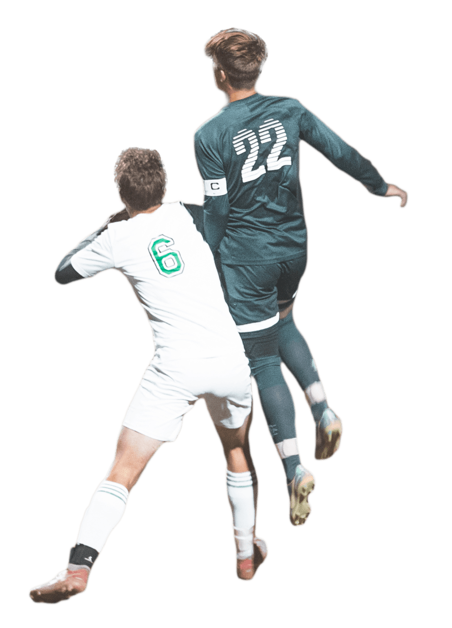 Young soccer players competing on the field