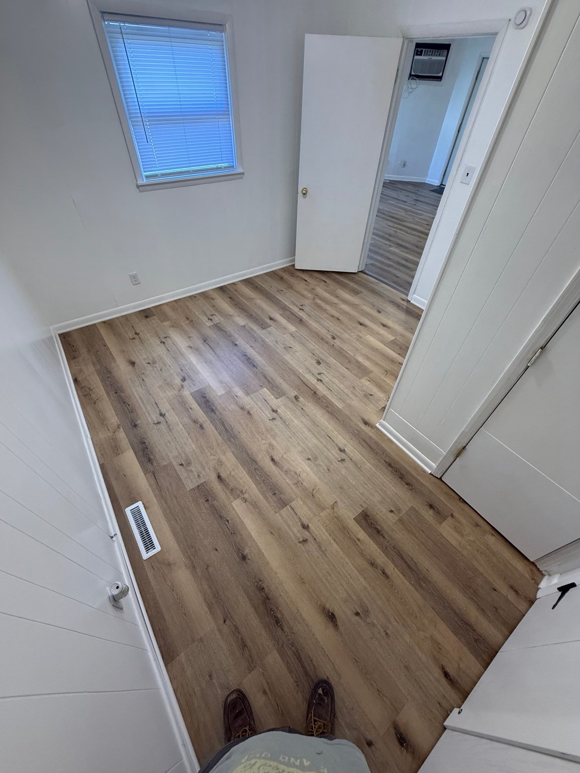 Repaired oak hardwood flooring in a living room
