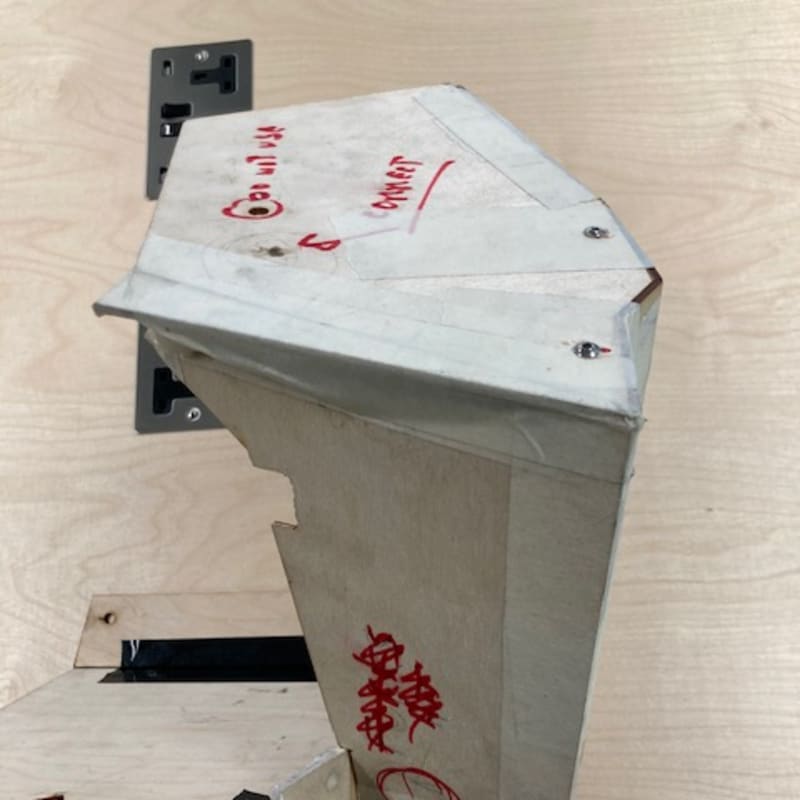 Stage 01: plywood and cardboard mockup with marker notes