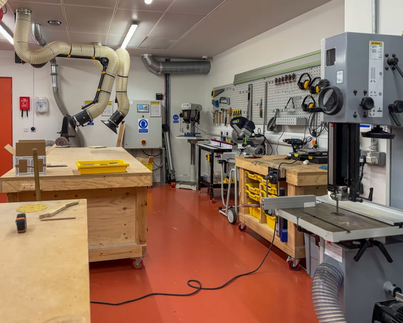Heavy workshop bay with pillar drill, mitre saw, bandsaw and dust extraction