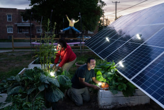 Family tends to community garden