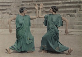 Two women dressed in costumes from ancient Greece