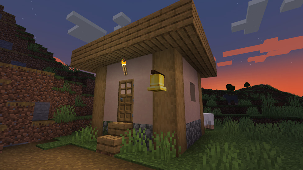 A bell on the house's wall