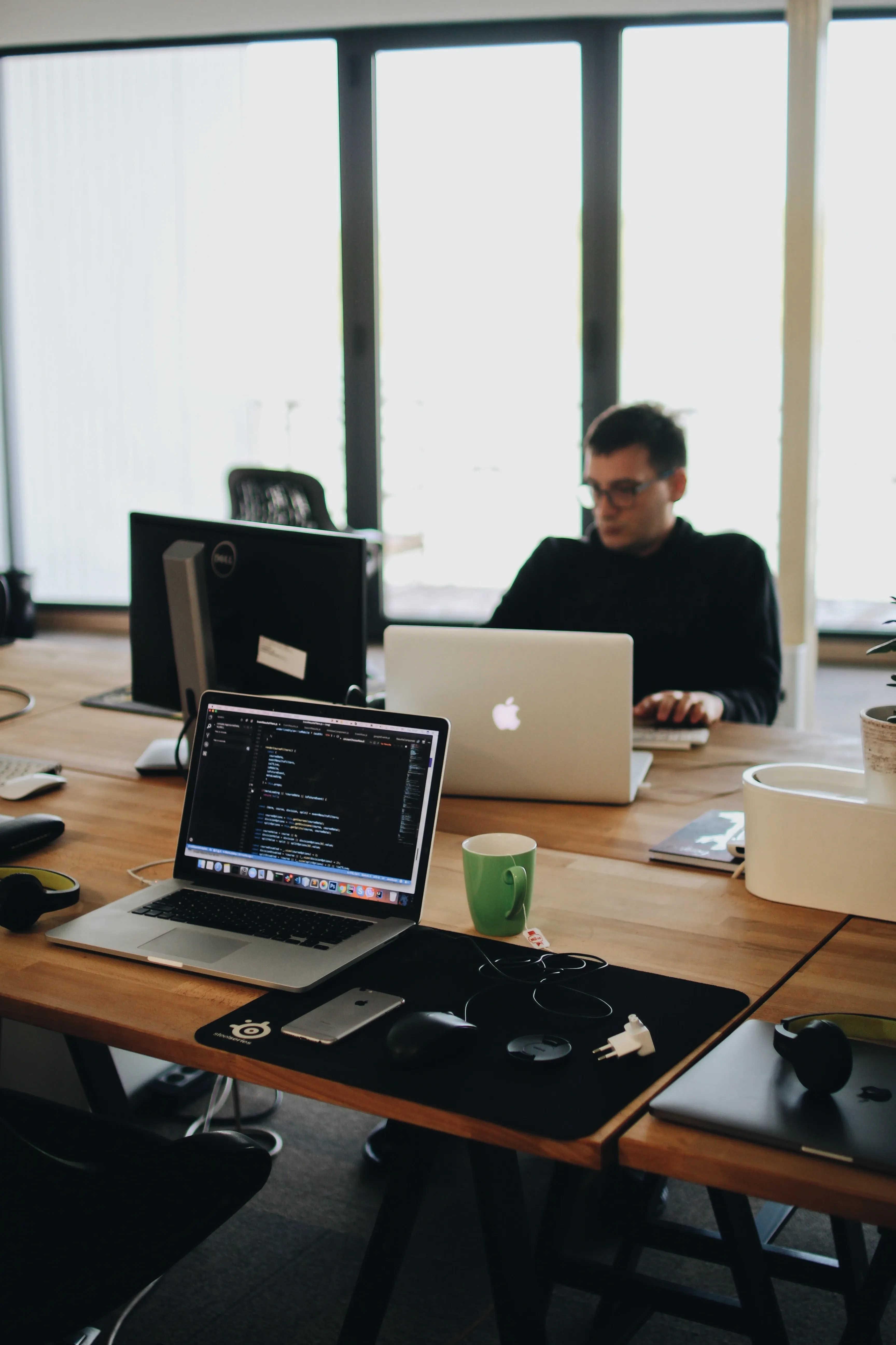 man-leveraging-technology-on-his-job.webp