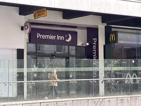 Entrance / frontage tucked between the HSBC and McDonalds “on the ramp” as known by Brummies. 