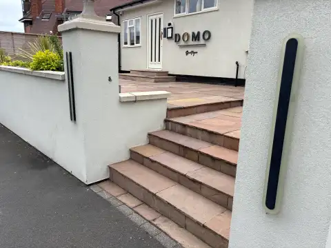 There are steps to negotiate to access the hotel entrance. 