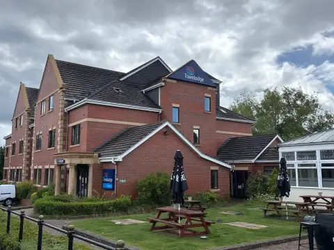 The hotel is next to the Ladybird Inn beer garden