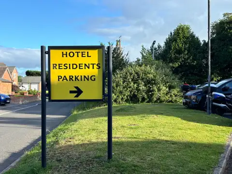 Around the back is a small car park for hotel residence access via Crown Road