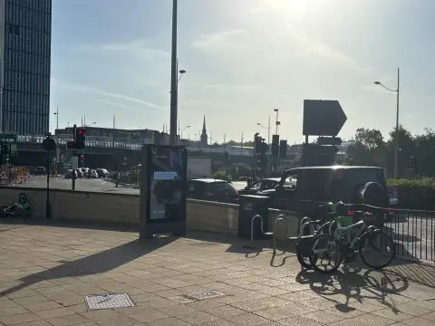 The hotel is next to a busy road
