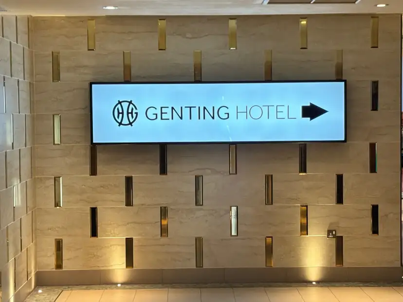 Genting Hotel entrance within the Resorts World Birmingham complex, showing modern glass frontage and covered canopy approach