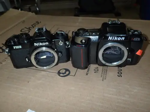 (2) Nikon 35mm SLR Cameras