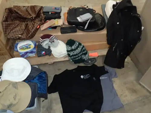 Assorted Purses, Wallets, Hats, And Clothing