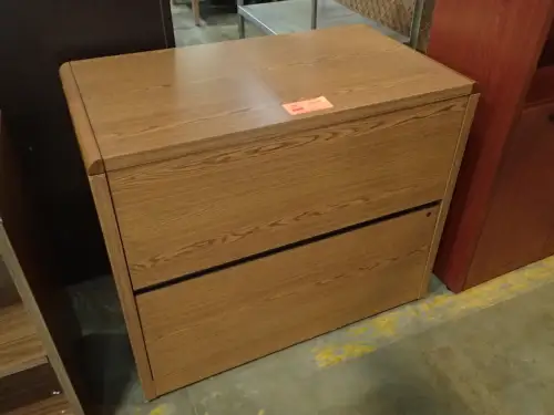 (1) Wooden File Cabinet