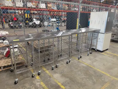 (6) Stainless Steel Carts and (2) Filing Cabinets