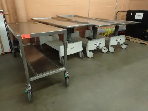 (7) Assorted Stainless Steel Operating Tables And Funeral Mortuary Stretchers