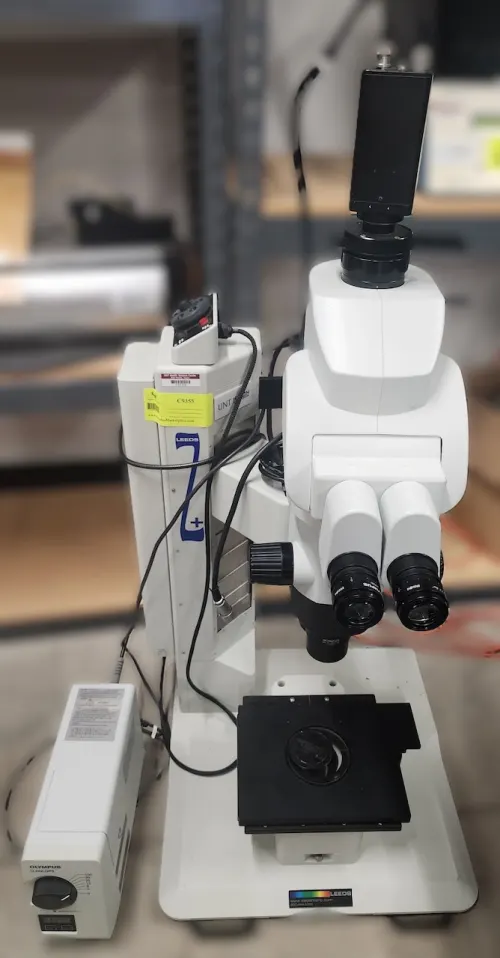 (1) Olympus MVX10 Microscope w/ objectives 