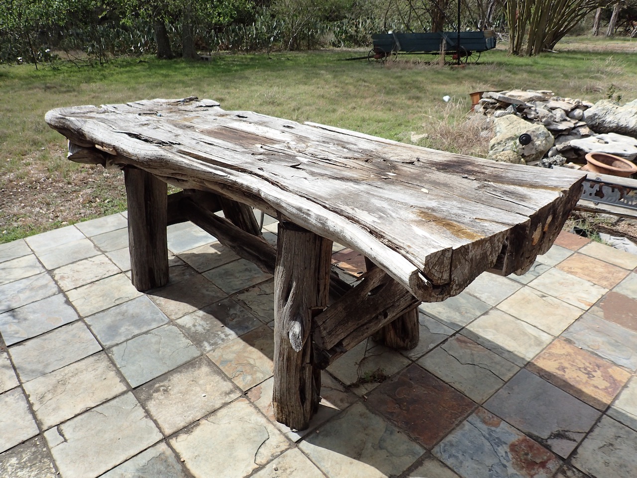 (1) Large Rough Hewn Cedar Table (Loc MH) | Surplus Marketplace