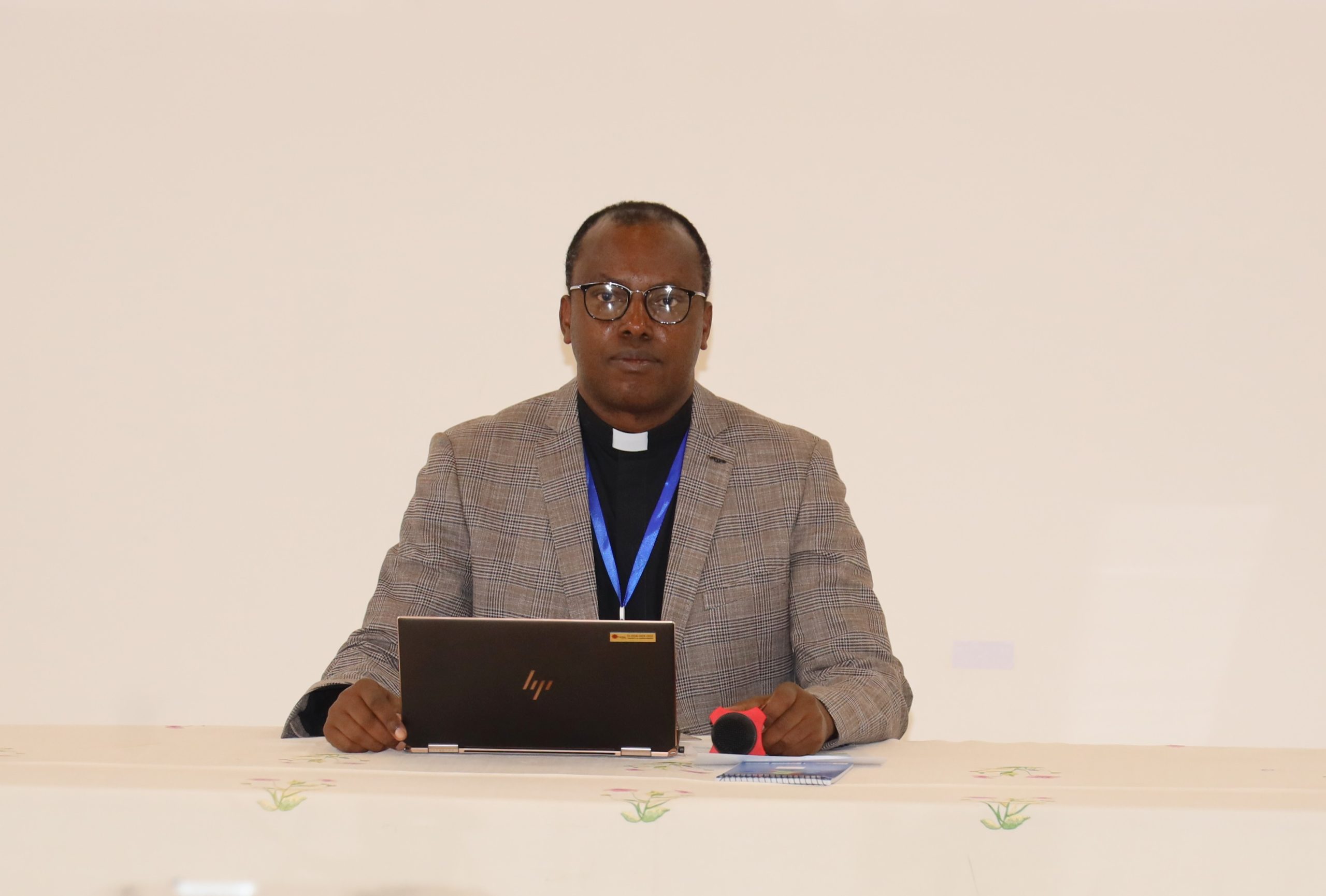 Father Oscar Kagimbura, the Secretary General of Caritas Rwanda, delivering the opening speech.