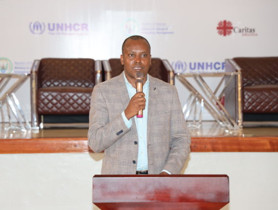 Father Oscar Kagimbura, the Secretary General of Caritas Rwanda, delivering the opening remarks.