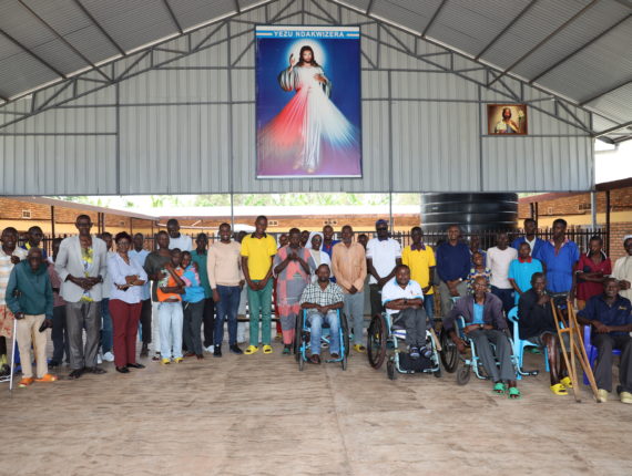 Group photo with people cared in Home of Joy managed by the Missionaries Of Charity Sisters in Ngoma.