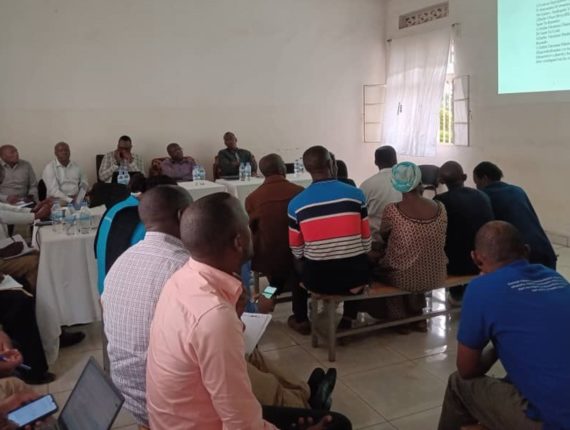 The team visiting the Rugarama Nutritional Center, participants are following a presentation of the Continuous Quality Improvement Project.