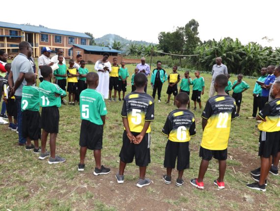 USAID Rwanda team and Rubavu District educational officials’ visit to children involved in the CBIM club at G.S. Shwemu II.