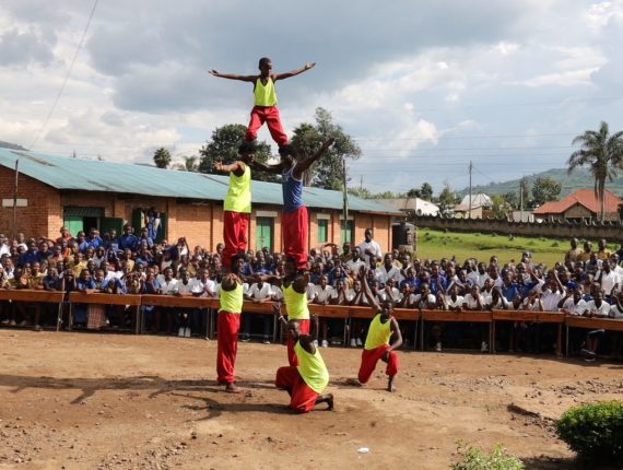 Vision Jeunesse Nouvelle acrobats perfoming at GS Rubavu