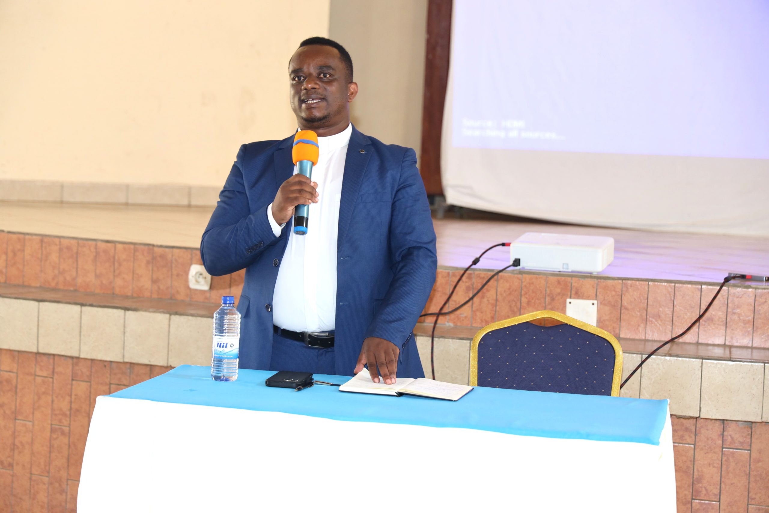 Father Emmanuel Bamporineza, Deputy Secretary General of Caritas Rwanda, delivering his speech.