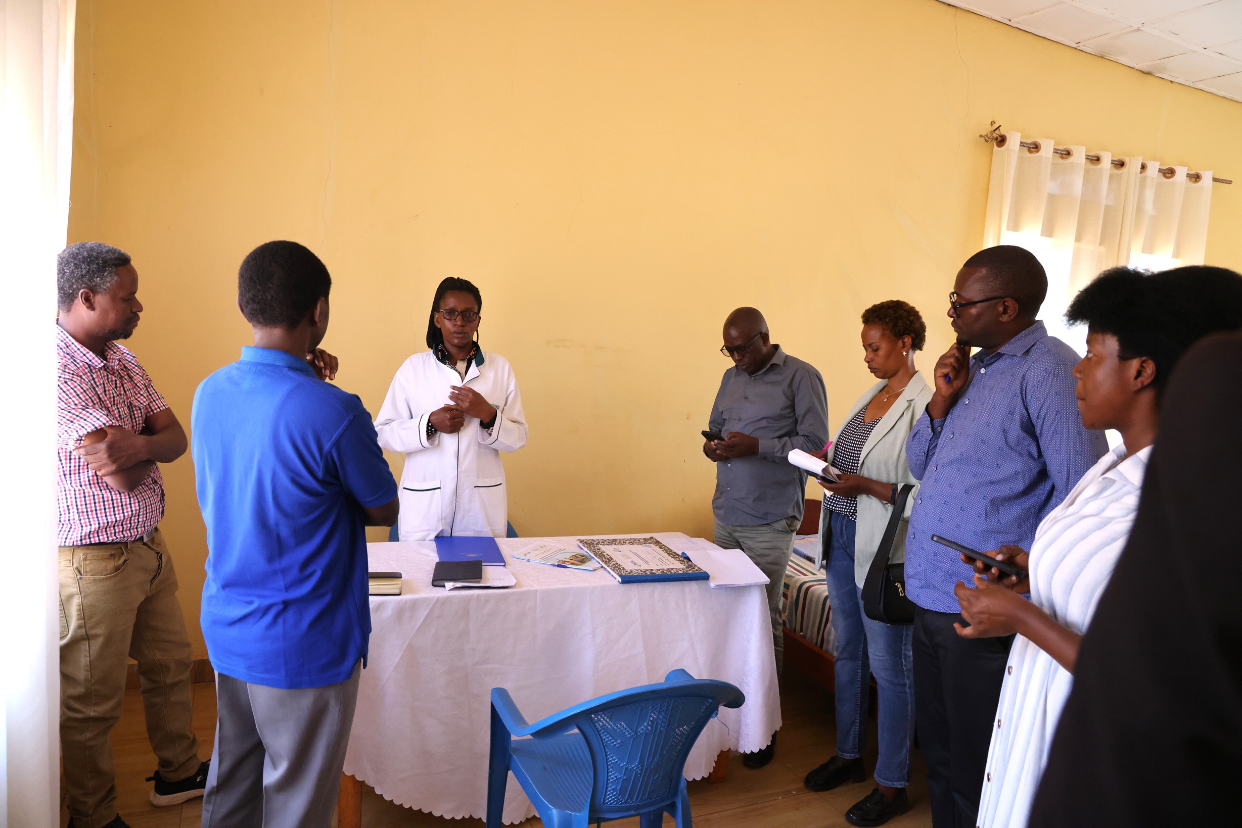 The monitoring team visiting the Girls' Room at Groupe Scolaire Shyorongi Impanganzi in Rulindo.