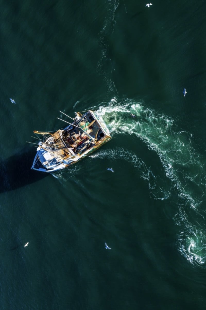 Aerial drone shot of fishing trawler